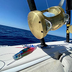 MagBay Lures Tuna Tidbit lure closeup highlighting cupped head and abalone shell for better action.