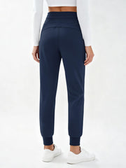 MAGCOMSEN women's fleece hiking pants navy high-waistband closeup for adjustable fit.