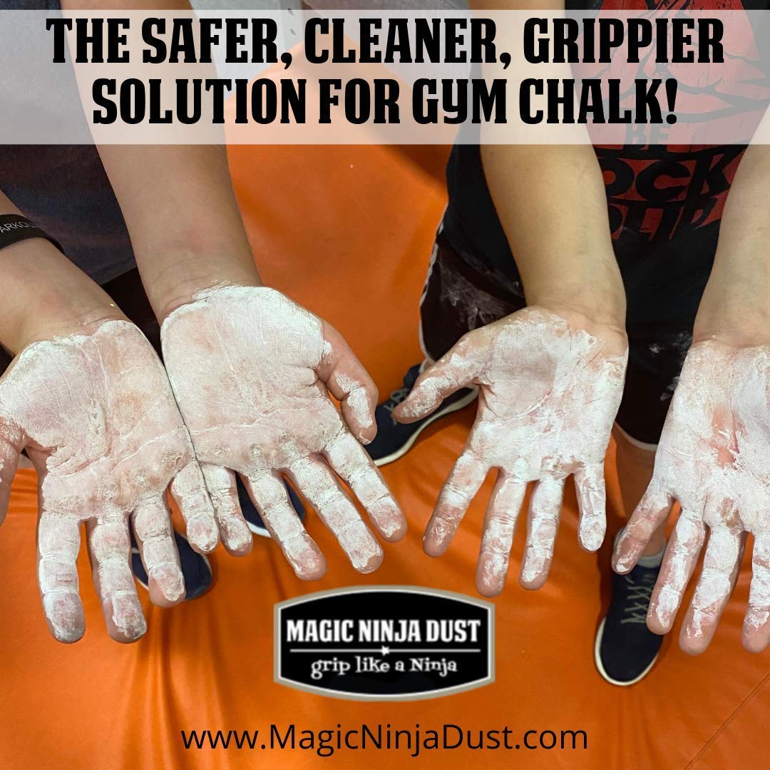 Magic Ninja Dust liquid chalk on hand applying for secure grip during workouts.