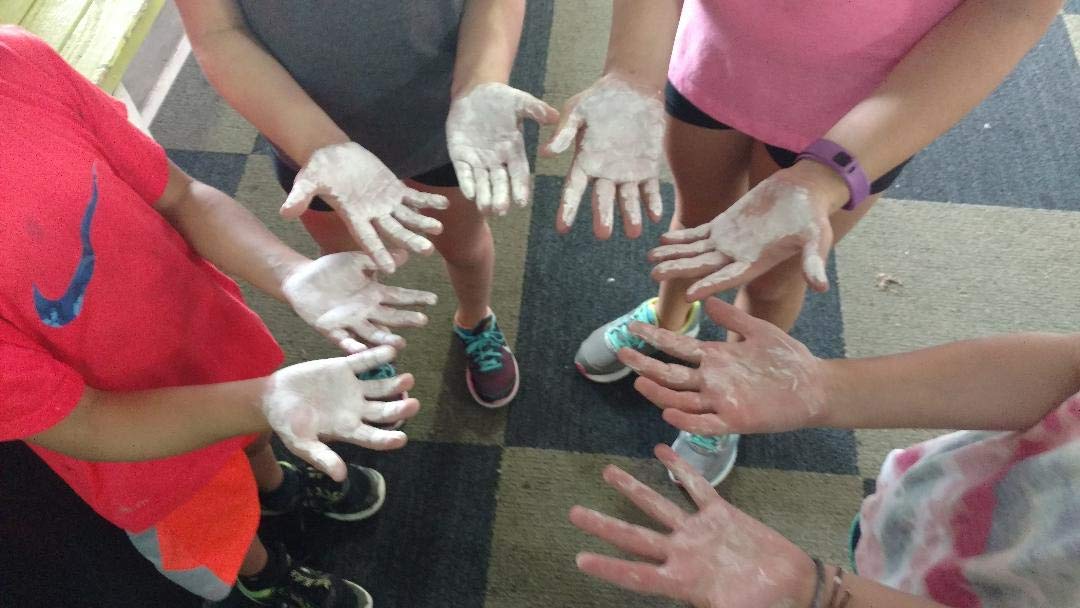 Magic Ninja Dust liquid chalk used for rock climbing holds and grip.