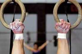 Magic Ninja Dust liquid chalk on hands during weightlifting for improved grip.