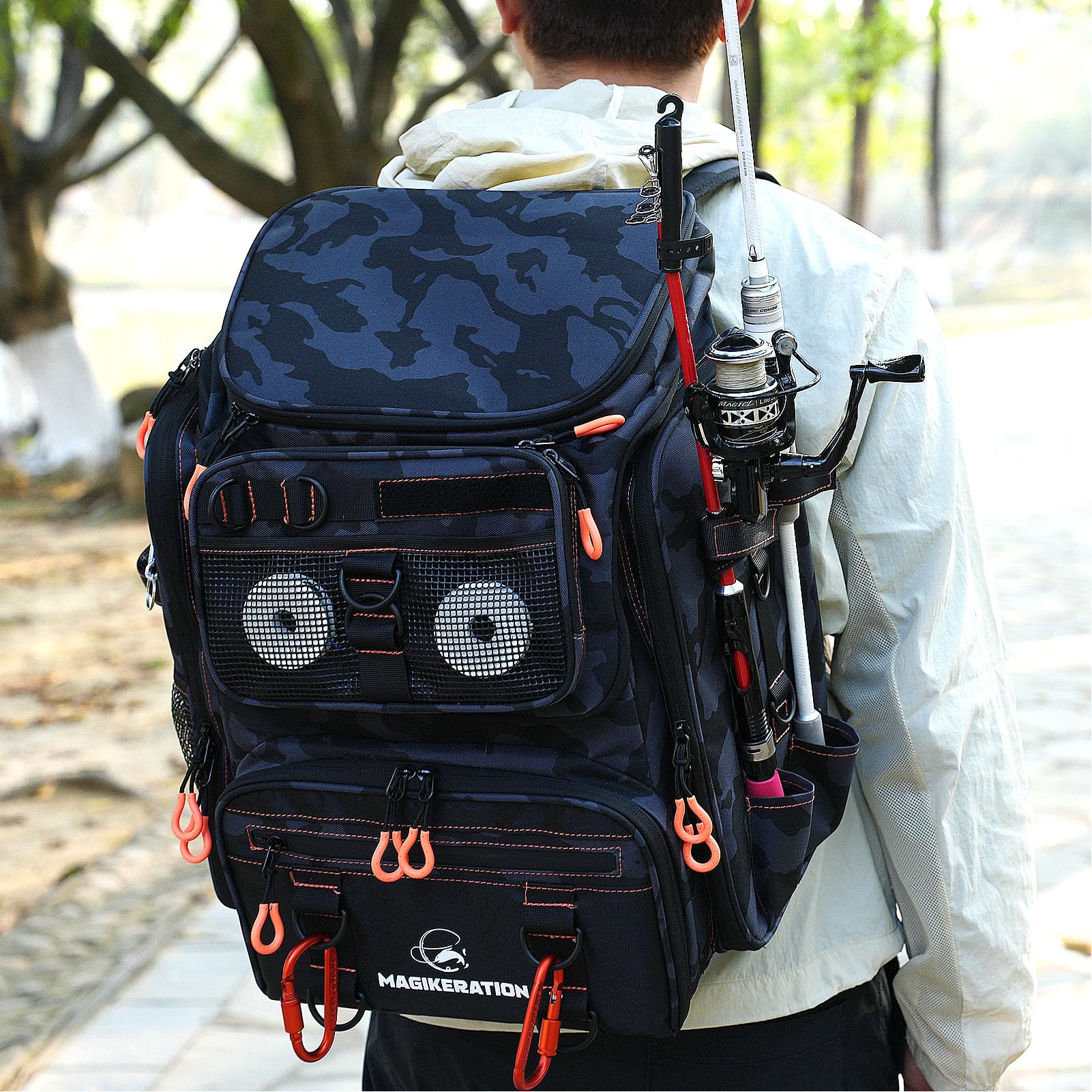 Magikeration fishing backpack waterproof fabric protects gear in wet weather.