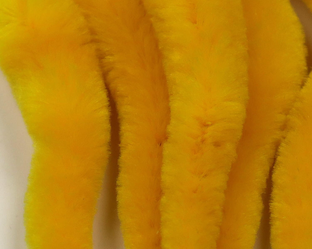 Mangums Micro Dragon Tails yellow 4in pack shot showcases compact size for versatile trout and bass fishing.