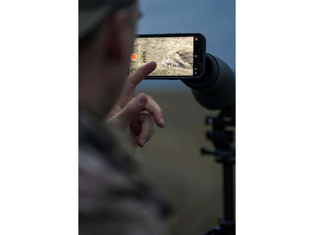MAGVIEW made-in-USA black adapter shown with phone plate for versatile field use.