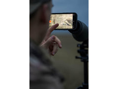 MAGVIEW made-in-USA black adapter shown with phone plate for versatile field use.