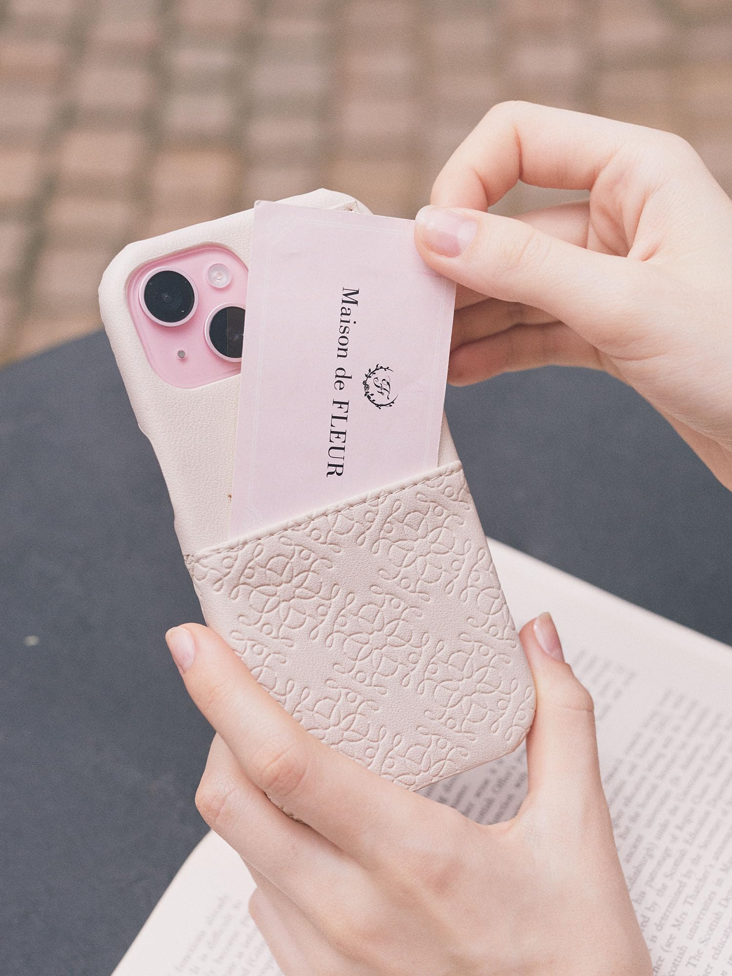 Maison de Fleur iPhone Case fleur monogram closeup highlighting stylish branding.