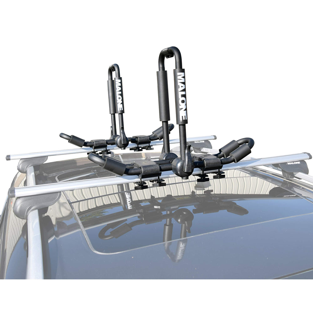 Malone FoldAway-5 load straps and bow-stern ties secure two boats.