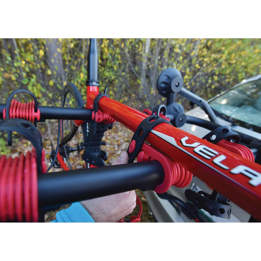 Six-point webbing strap stabilizing bikes on Malone BC3 OS
