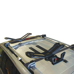 SeaWing/Stinger in loading action with 22-inch extension protecting kayak and vehicle.