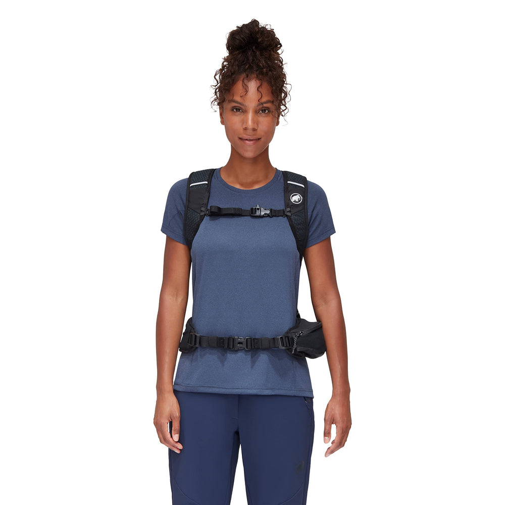 Mammut Lithium 20 trekking pole carrier keeps poles handy on trails