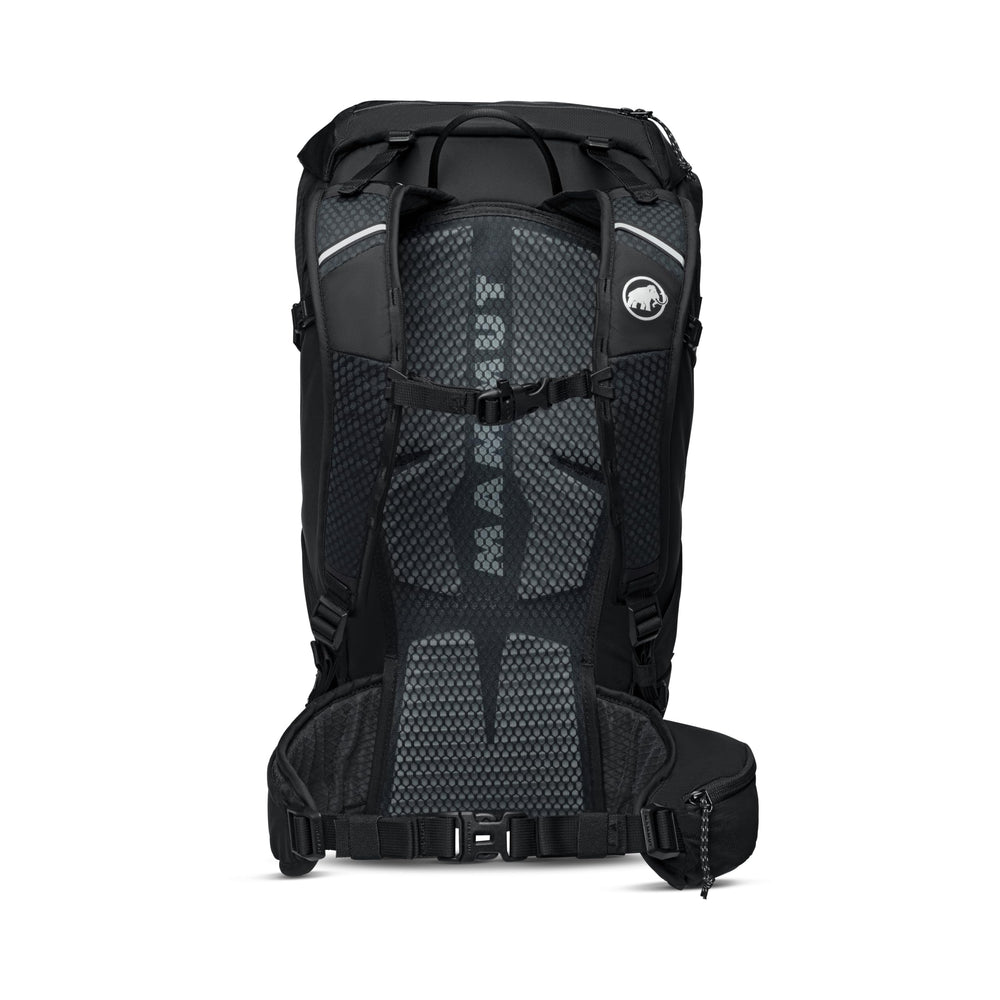 Mammut Lithium 30 lateral compression straps stabilize loads on rugged trails.