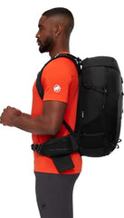 Mammut Lithium 30 trekking pole carrier provides hands-free hiking support.