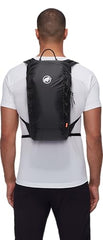 Mammut Neon Light chest strap demonstrates secure, adjustable fit during climbs.