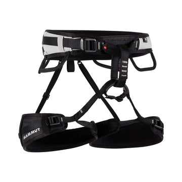 Mammut Ophir 3 Slide harness shown on a rock wall for versatile climbing.