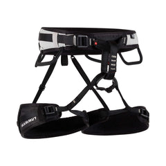 Mammut Ophir 3 Slide harness shown on a rock wall for versatile climbing.