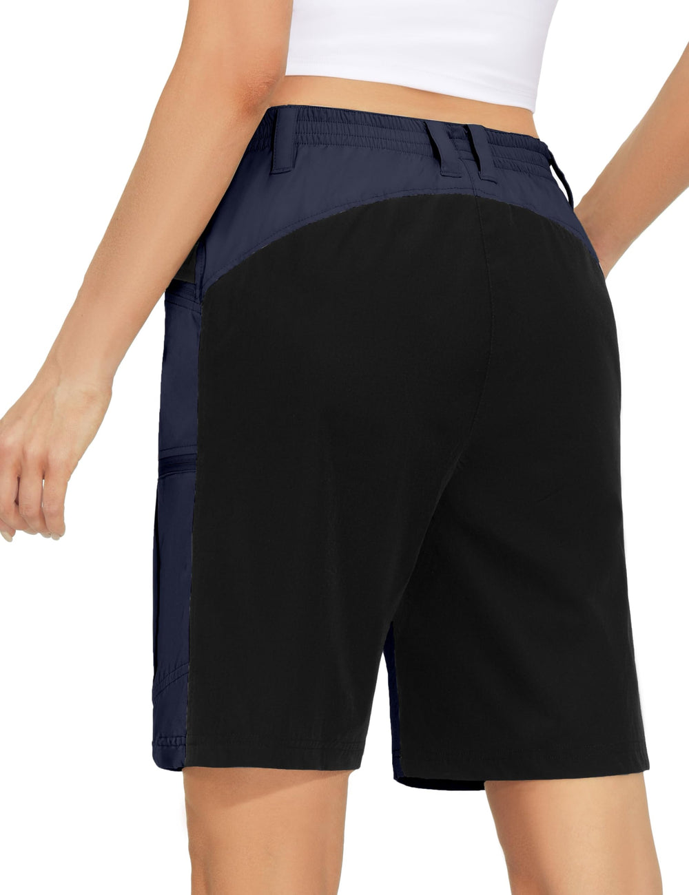 Mapamyumco shorts showing zippered pockets for secure on-trail essentials.