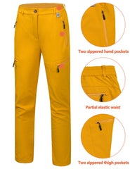 Mapamyumco women's softshell pants yellow pocket detail, six zip pockets for secure storage.