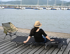 Marchway camping cot full-length setup shows stable frame for all-night comfort.