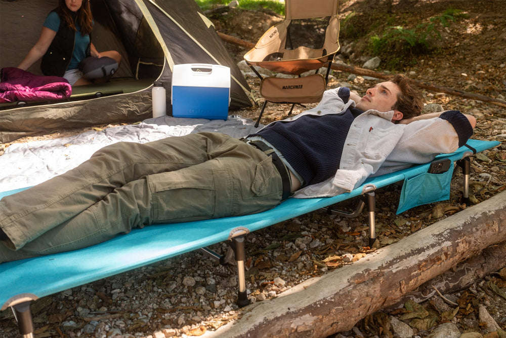 MARCHWAY blue cot side view highlights compact profile for travel