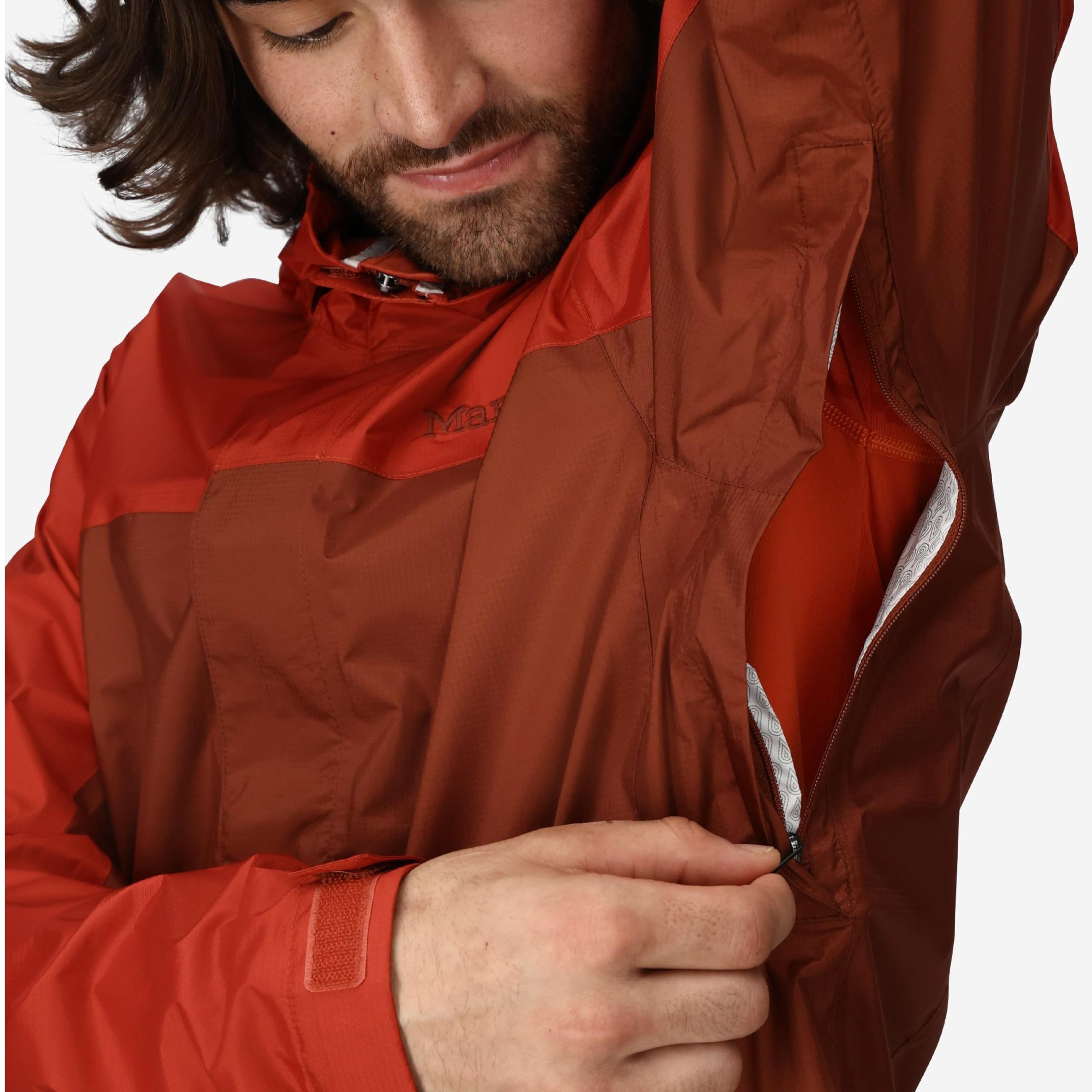 Marmot PreCip Eco rain jacket worn by model in pecan-sumac color for urban styling