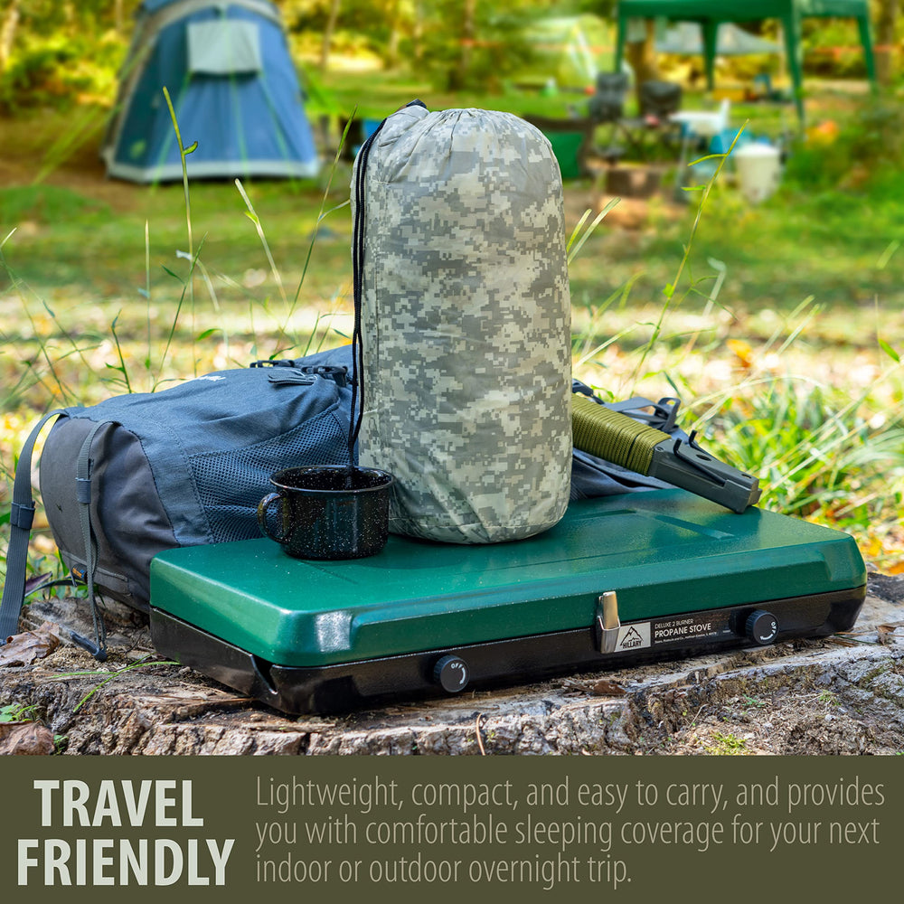 Maxam digital camo sleeping bag with water-resistant shell protects comfort during unexpected drizzle.