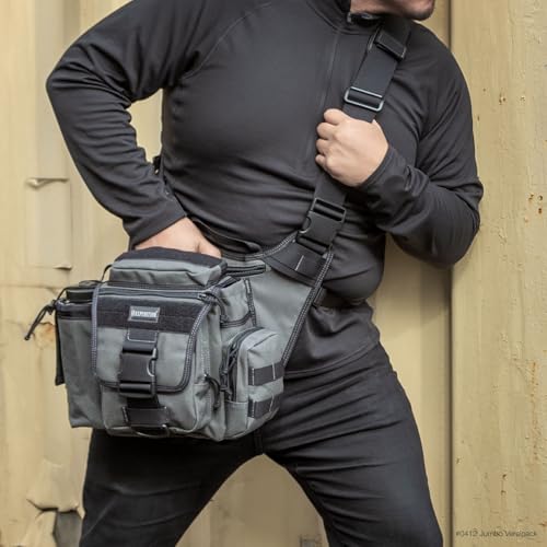 Maxpedition Jumbo Versipack rear CCW compartment for quick access.