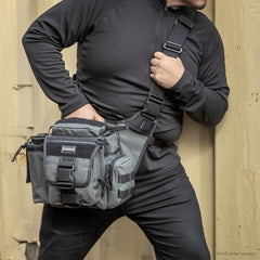 Maxpedition Jumbo Versipack rear CCW compartment for quick access.
