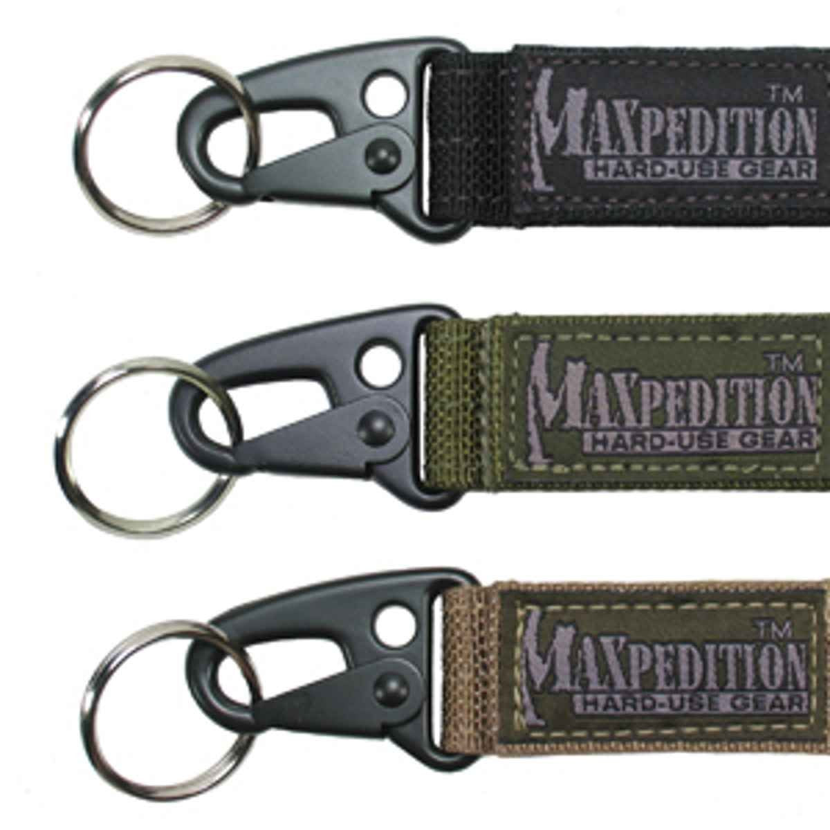 Maxpedition Keyper closeup in black showing compact retention and quick belt access