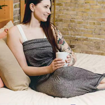 MBCBM Sleep Pod on family couch for cozy movie night relaxation.