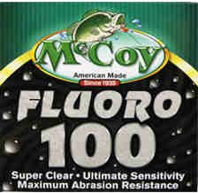 McCoy Fishing Fluoro100 spool showing crystal-clear, abrasion-resistant line for bite sensitivity.