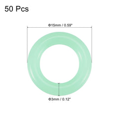Close-up of MECCANIXITY fluorescent silicone O-rings on tent stakes
