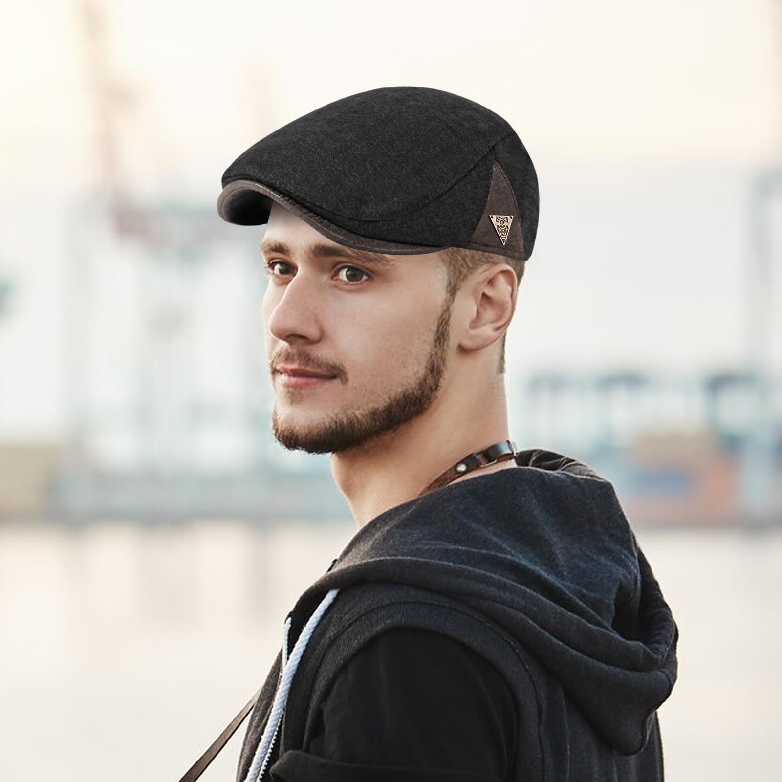 Adjustable buckle and strap on black newsboy cap