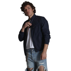 Members Only windbreaker navy packed-in-pouch shows portable, travel-ready design.