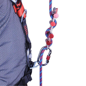 Menolana Rack Descender side view highlighting slim profile for quick attachment and rope management.