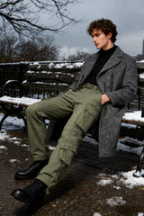 MERJAZ fleece-lined cargo pants with water-resistant shell for wet outdoor trails.