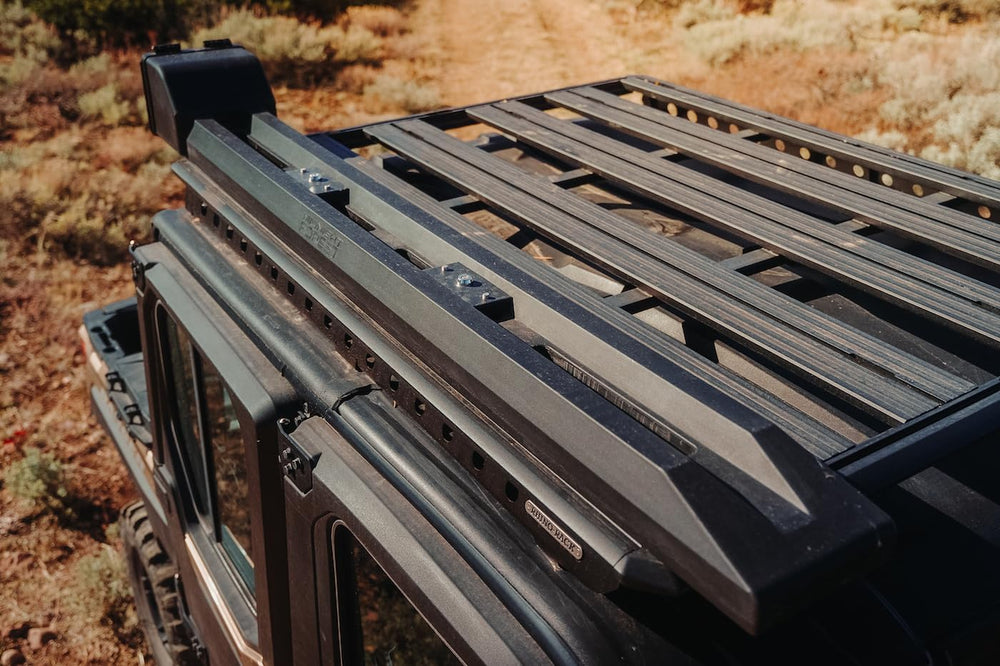 Midnight Forest Fly Rod Locker mounted on roof rack enables quick access and secure transport.