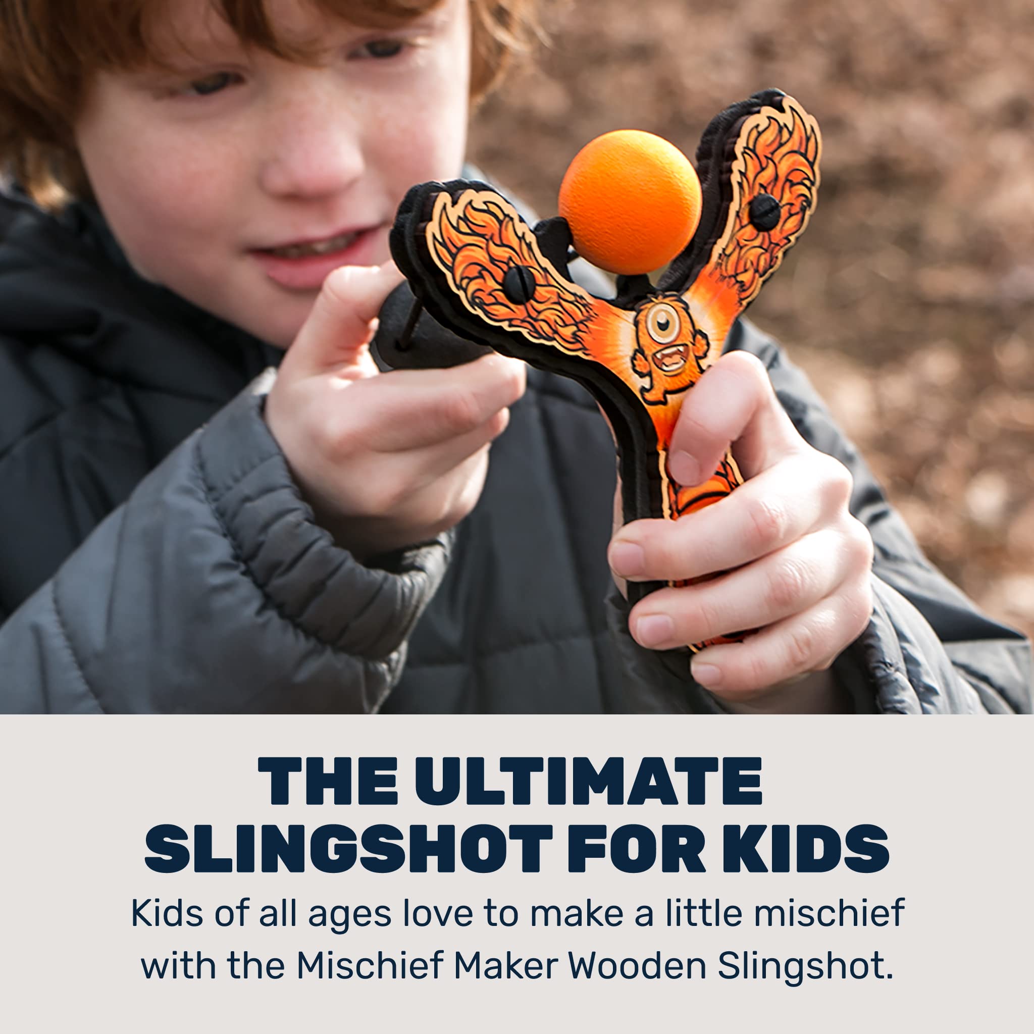 Mighty Fun! Mischief Maker slingshot side view highlights durable wood and playful monster.