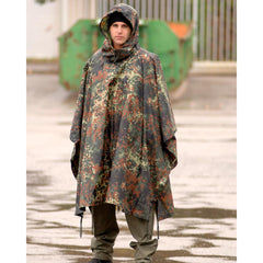 Mil-Tec ripstop poncho folded compact demonstrates easy transport and quick setup.