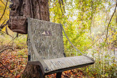 Millennium M350 tree seat attached securely with Cambuckle strap for quick setup.