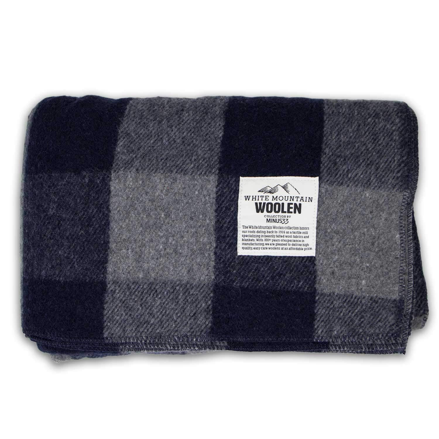 Minus33 Camp Throw Blanket in gray-blue plaid enhances picnics on cool evenings.