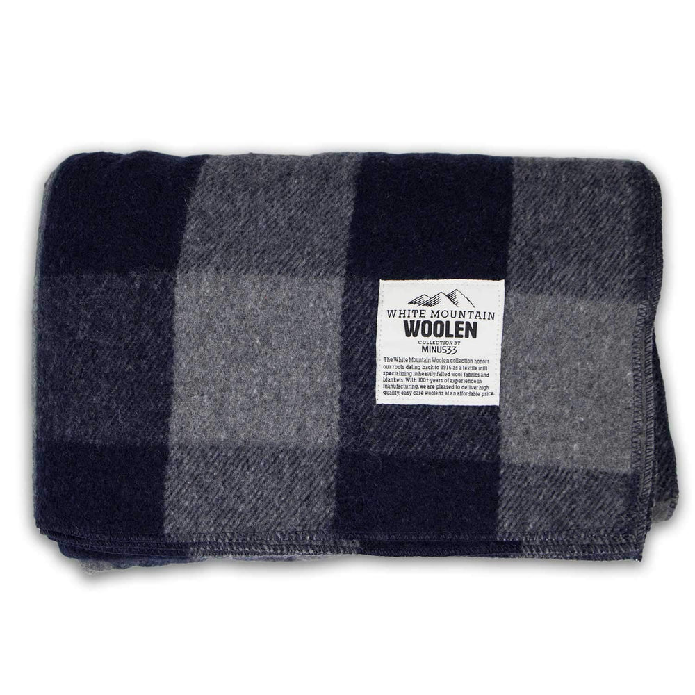 Minus33 Camp Throw Blanket in gray-blue plaid enhances picnics on cool evenings.