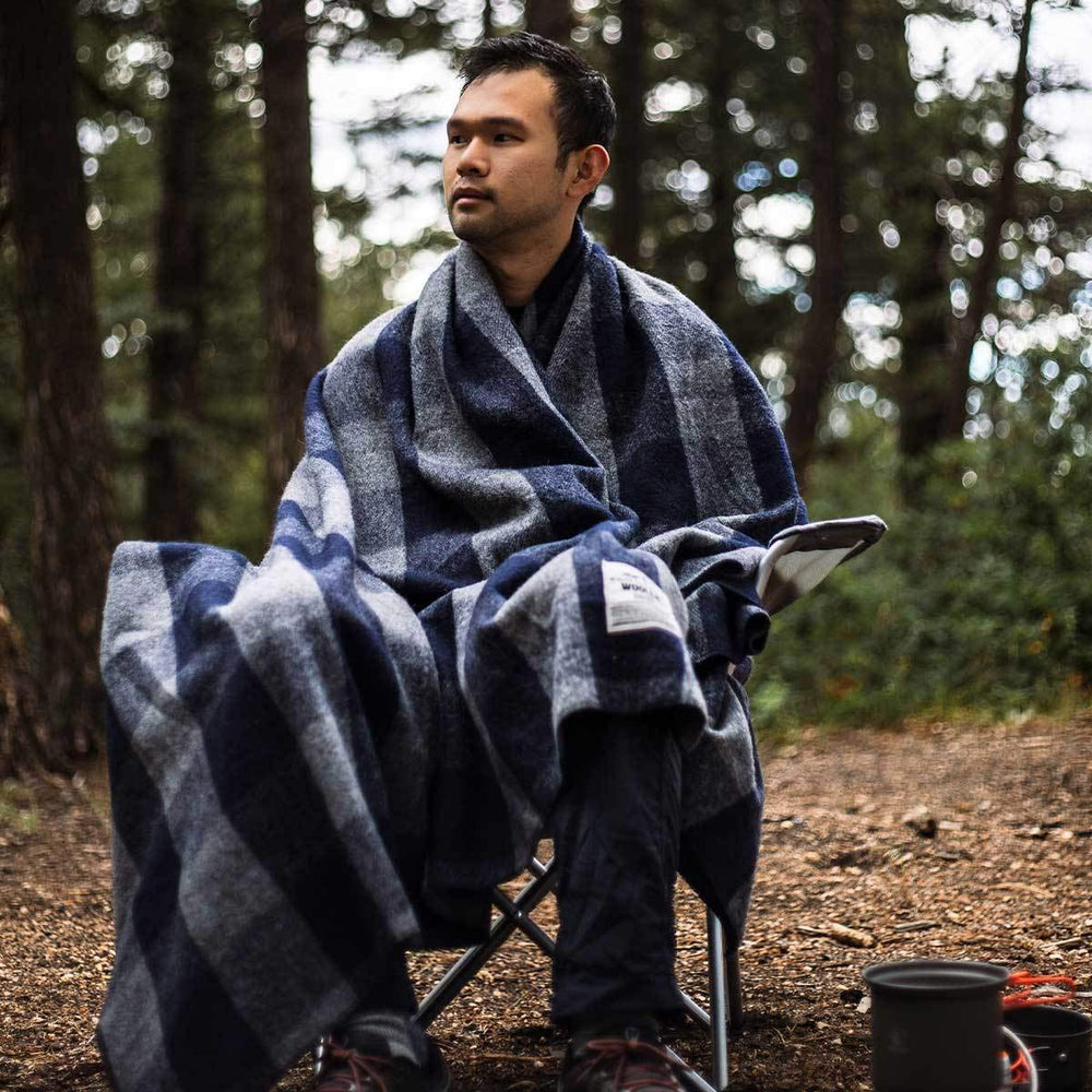 Minus33 Camp Throw Blanket measures 62 by 80 inches for versatile use.