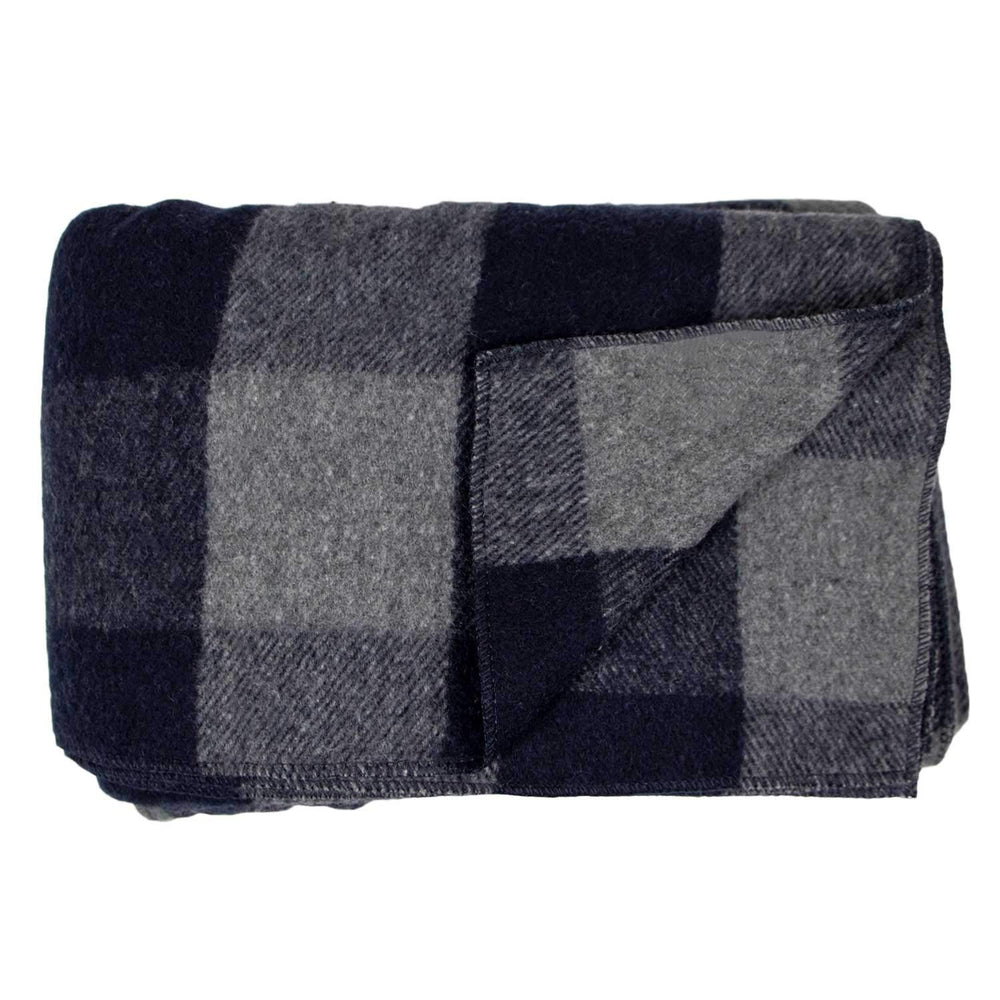 Minus33 Camp Throw Blanket with dense fabric delivers warmth for chilly campfire nights.