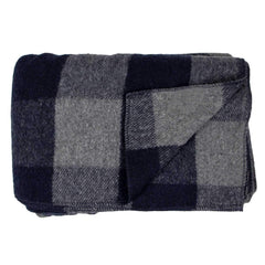 Minus33 Camp Throw Blanket with dense fabric delivers warmth for chilly campfire nights.