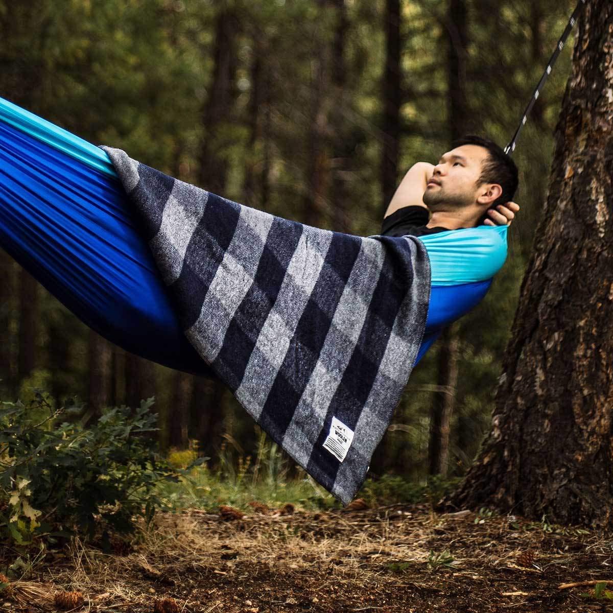 Minus33 Camp Throw Blanket is washable for easy cleanup after adventures.