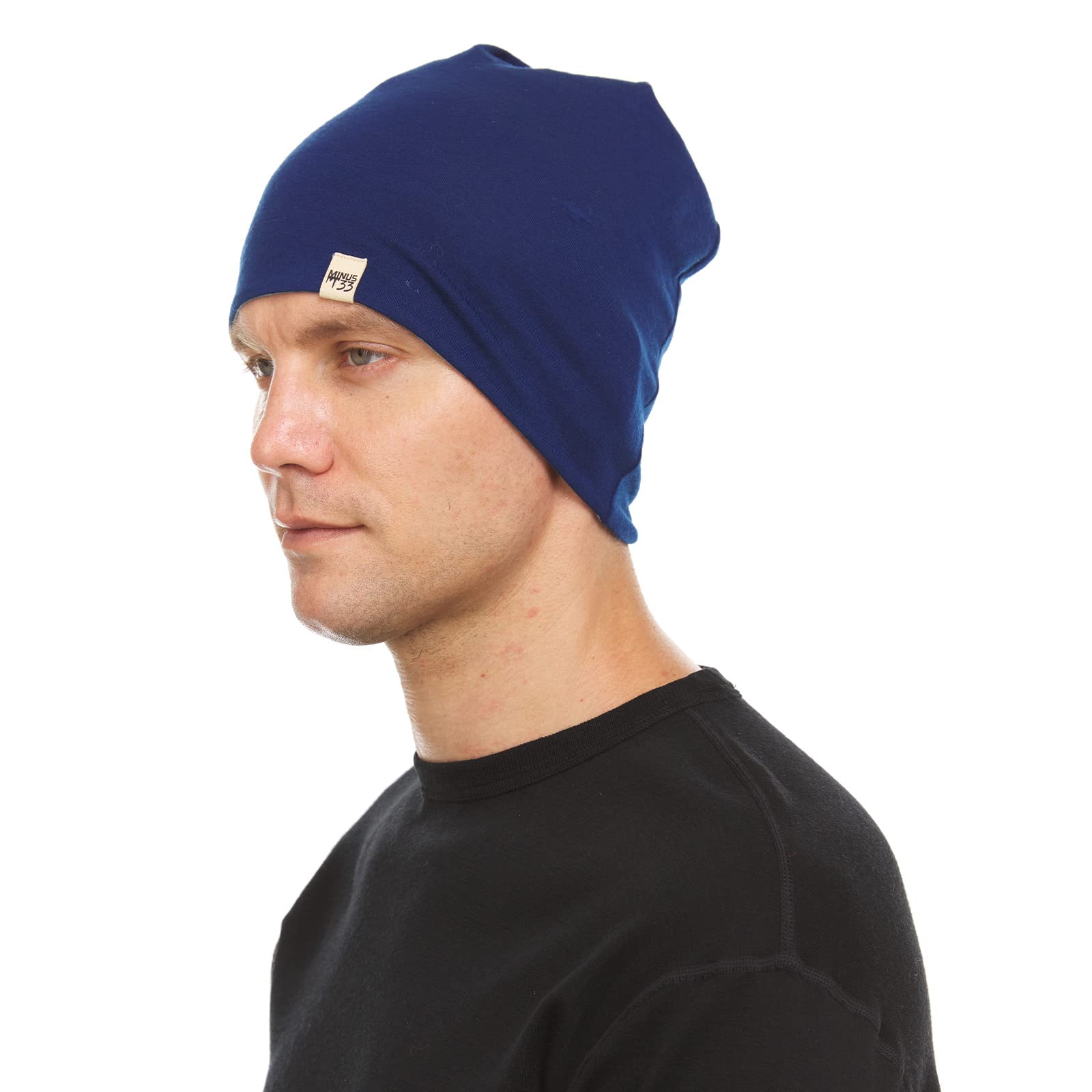 Minus33 Merino Wool Micro Weight Reversible Beanie in Navy Blue and Slate Blue – front view