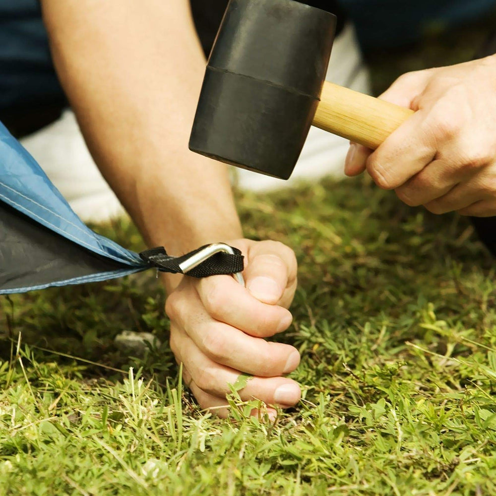 MIVIDE tent stake in-ground use demonstrates stable anchoring for tents and shelters.