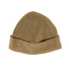 Rolled and packable grid fleece cap ready for easy carry on outdoor adventures
