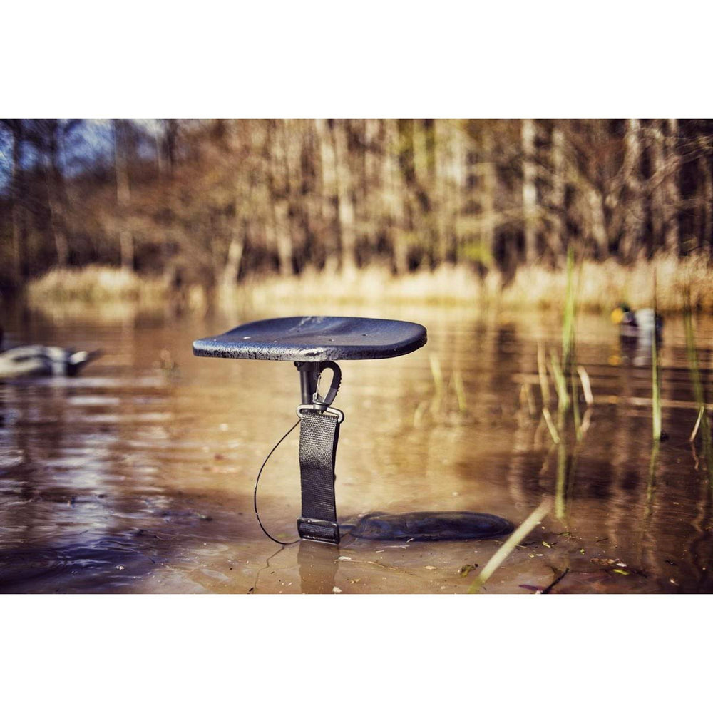 MOJO Outdoors mud seat demonstrates stability in mud with three lateral supports