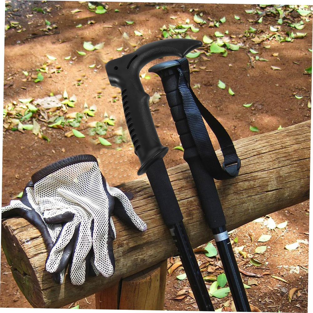 MOLUCKFU trekking pole handle in use during a mountain hike.